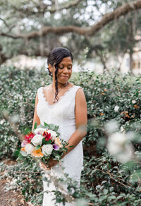 "A stunning bridal portrait taken beneath the iconic live oaks of Wormsloe, capturing elegance and natural beauty."