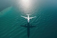 Plane flying low over ocean