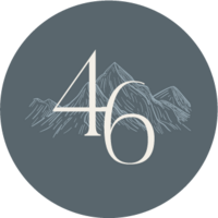Circle logo with mountain range behind the number 46.