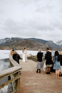intimate first dance on a dock