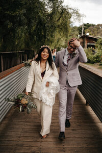 bride and groom cuddling during their sunset photos in Mount Macedon
