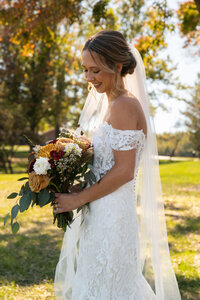 midwest fall weddding couple portraits after first look
