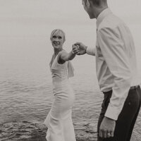 Married couple on their wedding day taking photos in the North Shore of Minnesota