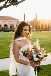 Bride holding flowers on wedding day with a Wedding Photography Minneapolis.