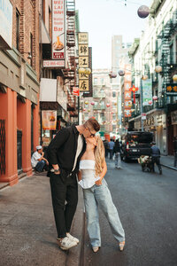 couple kissing on the street