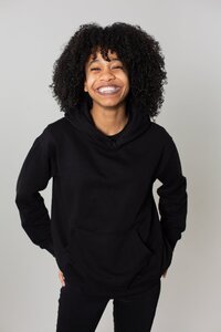 girl smiling in black sweatshirt