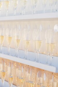 Champagne wall with glasses filled up