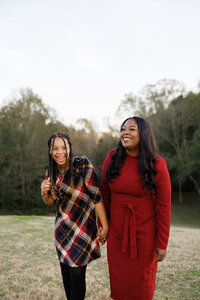 Mother and daughter laughing