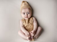 Adorable baby with big blue eyes. Greater Manchester newborn photos