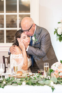 Bride and groom embrace on their wedding day