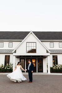 Groom kissing Bride's cheek under the veil