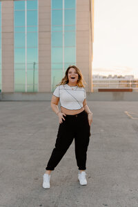 Couple running together after ceremony in black and white