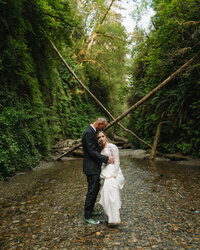 groom hugging bride