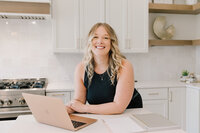 Raleigh Realtor Georgia Donovan working behind computer