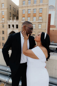 bride and groom embrace at wedding in texas