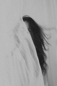 Soft silhouette of a woman in motion, symbolizing intuitive flow and soulful transformation
