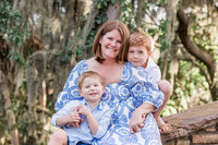 Family hugs during photo shoot with St. Pete photographer