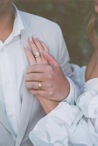 bride and groom with rings