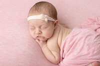 newborn baby girl in pink during her Lehigh Valley Newborn Session