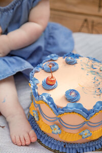 close up of cake smash session with classic buttercream cake from sweet heather anne