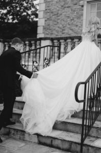 stacie hawkins hugging bride in wedding dress