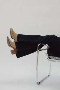 A close-up showcasing stylish boots, representing a specific aesthetic detail that could be incorporated into a website design. Use this image to highlight visual elements and create a visually appealing online presence. See our portfolio for aesthetic website design inspiration