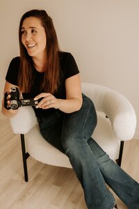 Woman sitting on a chair, posing for a photoshoot