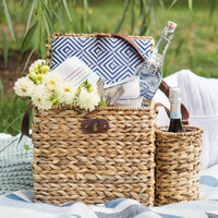 picnic setup with basket and wine