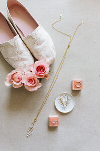 wedding details with shoes and rings