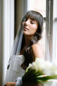 veil half infront of brides face