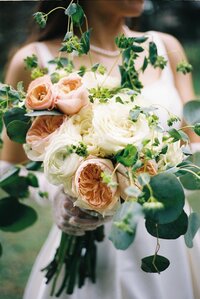 wedding, bride holding beautiful bouquet of flowers, 35mm film wedding photographer