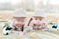 Senior guy smiles with arms crossed for Hamilton Montana senior pictures
