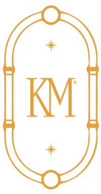 KM logo in gold.