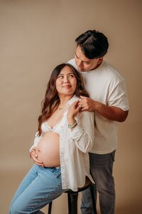 family of 3 during studio newborn portrait sessions