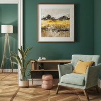 Stylish reading nook with a mint armchair, yellow pillow, abstract art, wood accents, and green walls.