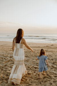 Sunrise beach family session in Sandbridge Beach, Virginia. 