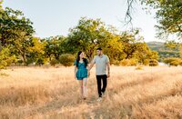 Couple Walking in a Field | Photography by Jocelyn