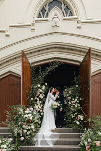 bride and groom kissing at wedding in melbourne
