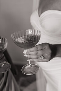 Bride drinking cocktail at intimate Idaho wedding