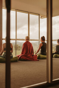 Serene meditation moment at a wellness retreat, captured for event photography Sunshine Coast.
