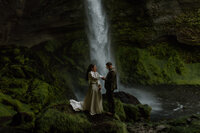 Iceland elopement ceremony at Kvernufoss with bride and groom