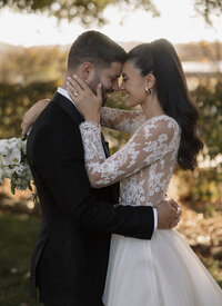 bride and groom embracing