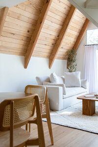 white living room in an a-frame cabin in lake arrowhead california