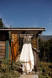 Plates of food sitting on a wooden table 