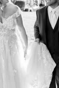 Bride and groom walk up memorial steps at their DC wedding