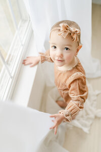 baby girl sitter session nursery