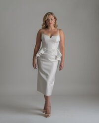 Midi wedding dress with peplum and 3D flowers