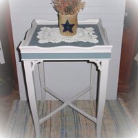 table painted with a doily on top