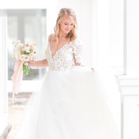 Swan Lake Event Center Wedding bride is in Hayley Paige wedding gown.