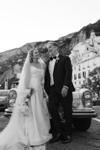 Bride and groom walk up memorial steps at their DC wedding